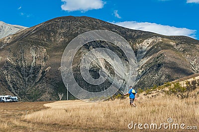 Tourist visiting Castle Hill in Southern Alps, Arthur's Pass, South Island of New Zealand Editorial Stock Photo
